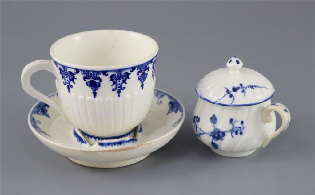 A St. Cloud cup and trembleuse saucer, c.1725-1740 and a Chantilly custard cup and cover, c.1750, (4)